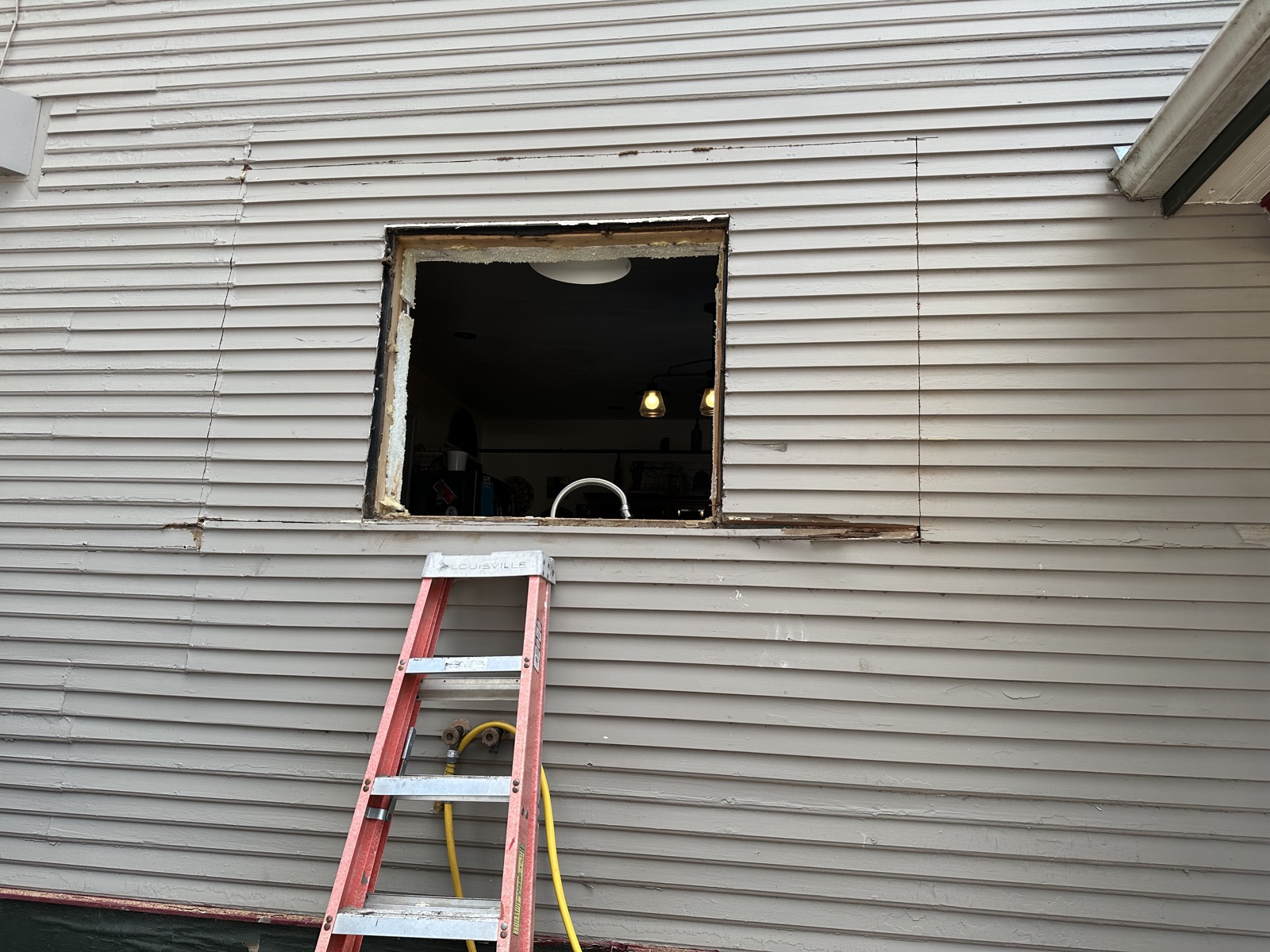 Exterior wall window opening cut