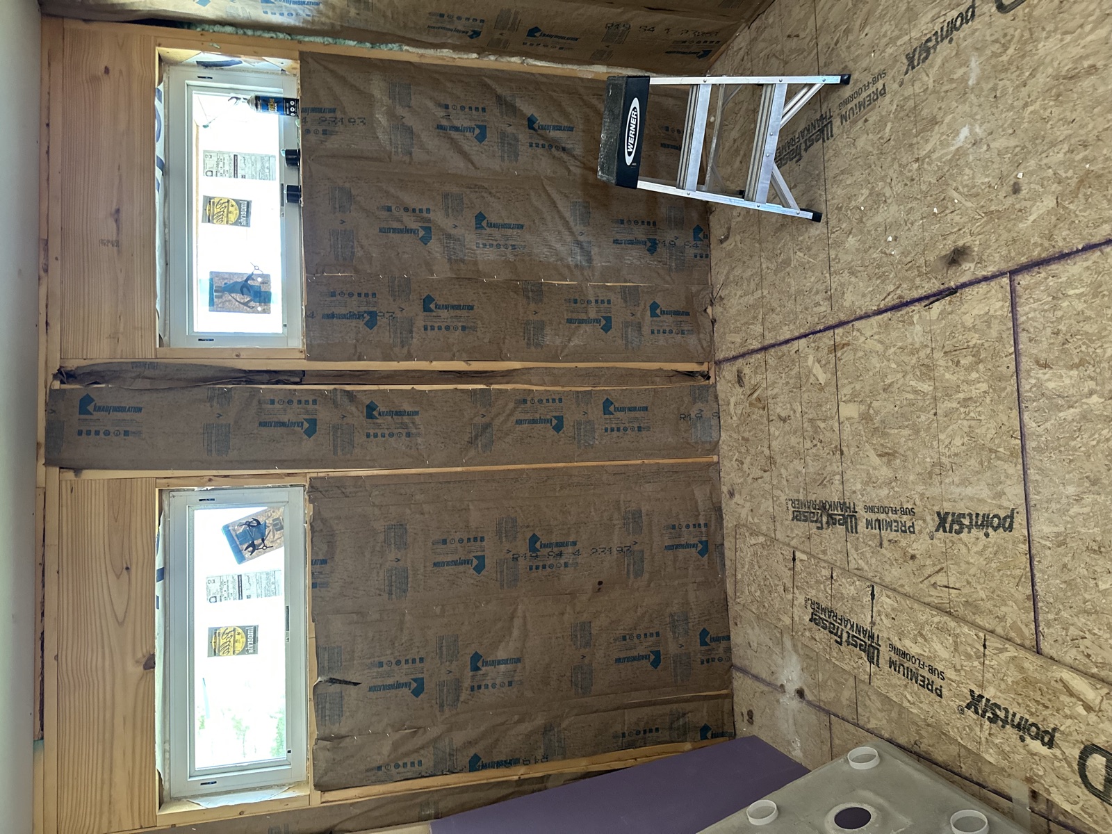 Knauf fiberglass insulation batts in wall cavity