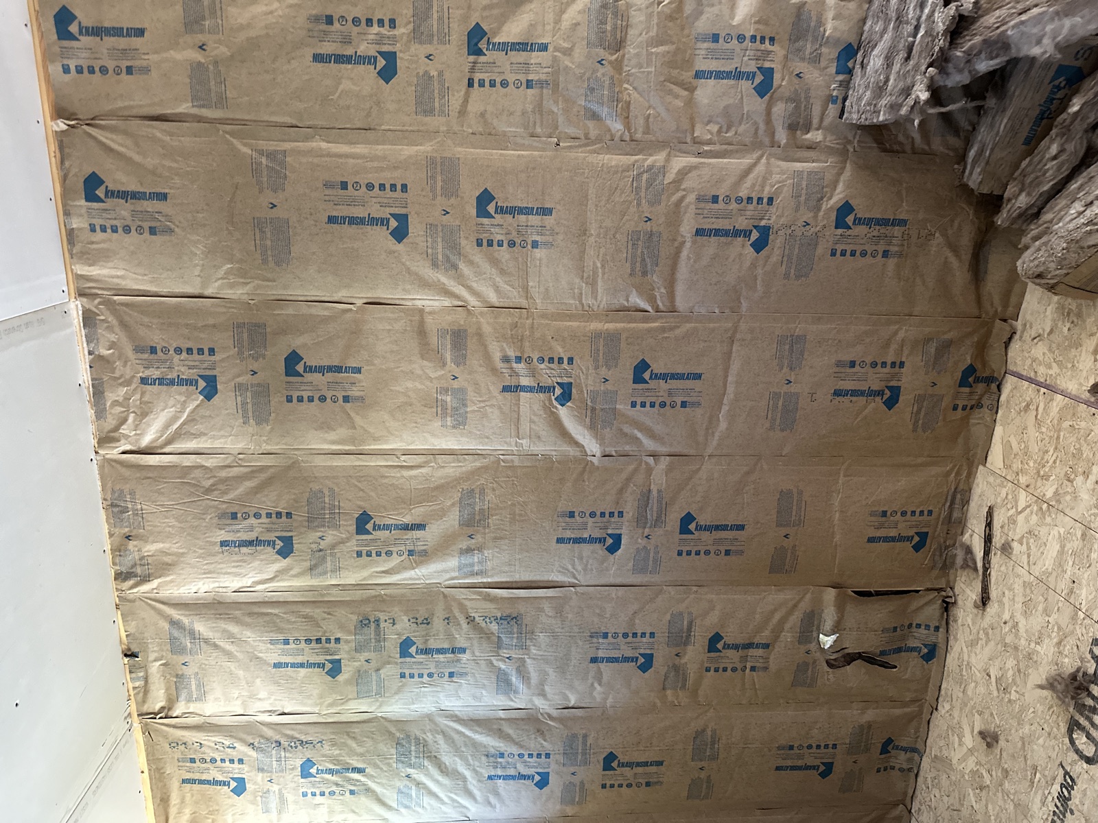 Knauf insulation in loft with floor and windows