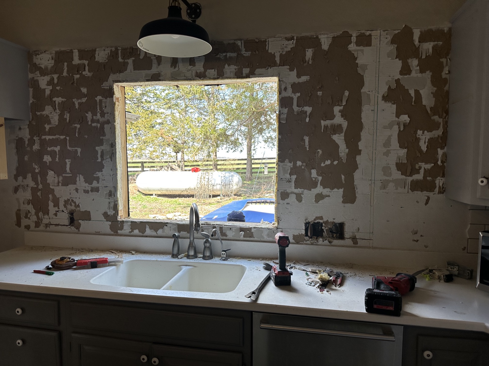 Kitchen demolition with plaster peel